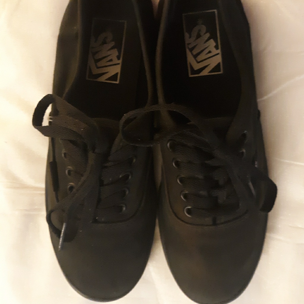 Solid Black Universal Vans...